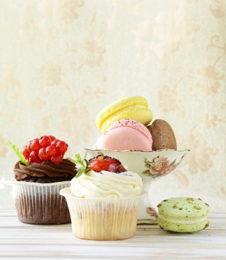 tatil tatlılar, kekler ve antika arka plan üzerinde macaroons