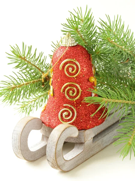 Weihnachtskomposition - rotes Glockensymbol des Feiertags — Stockfoto