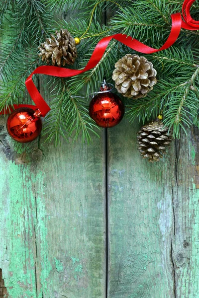 Christmas composition with fir twigs and decorations — Stock Photo, Image