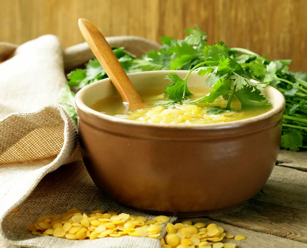 Yellow lentil soup with green coriander — Stock Photo, Image