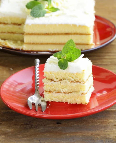 Sponge cake with white chocolate and coconut — Stock Photo, Image