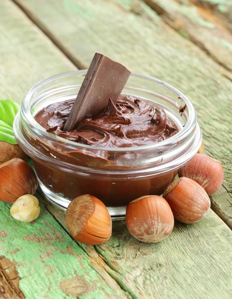 Sweet chocolate hazelnut spread with whole nuts — Stock Photo, Image