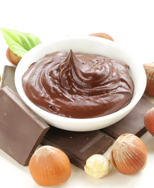 Sweet chocolate hazelnut spread with whole nuts — Stock Photo, Image
