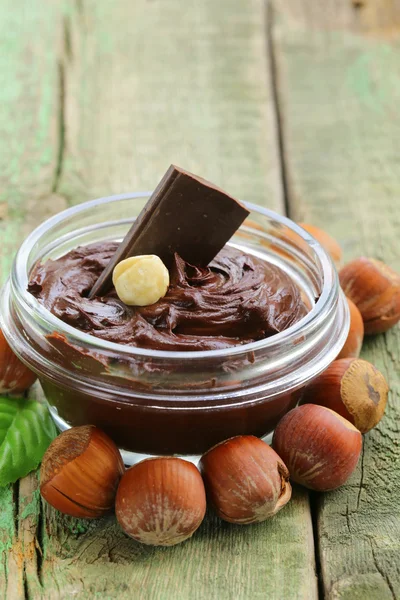 Sweet chocolate hazelnut spread with whole nuts — Stock Photo, Image