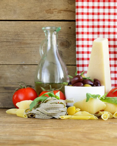 Still life of Italian foods ( olive, oil, pasta, cheese ) — Stock Photo, Image