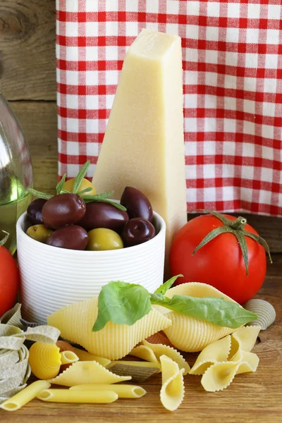 Still life of Italian foods ( olive, oil, pasta, cheese ) — Stock Photo, Image
