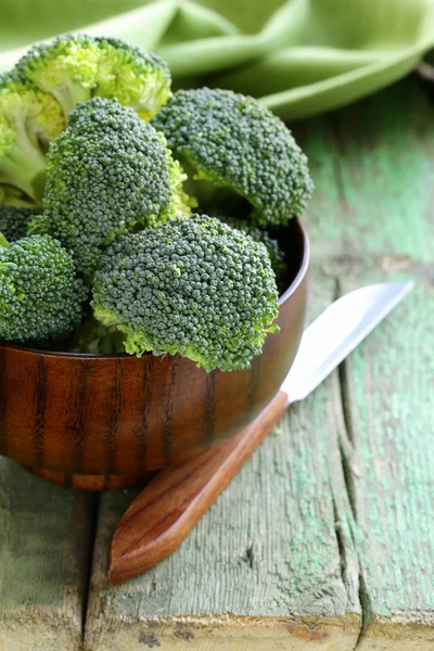 Fresh green broccoli on a wooden table — Stock Photo, Image