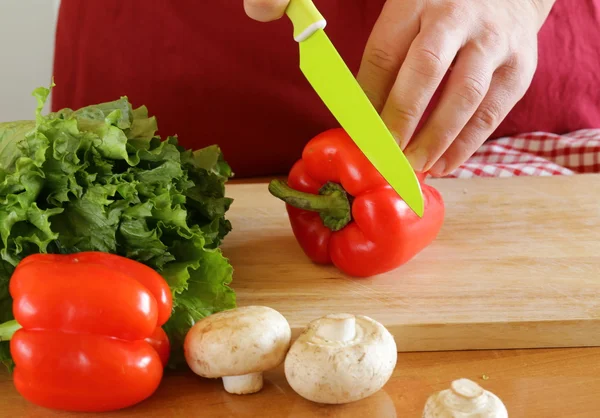 Hand man chef cooking vegetable salad — Stock Photo, Image