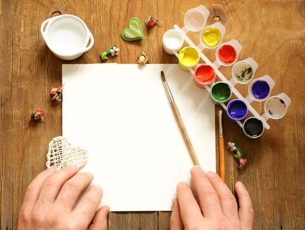 Painting set - brushes, paints (gouache) on old wooden table — Stock Photo, Image