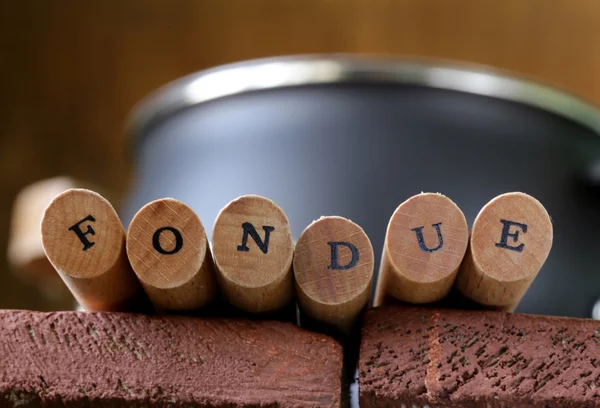 Särskilda fondue gafflar med bokstäver mjukt fokus — Stockfoto