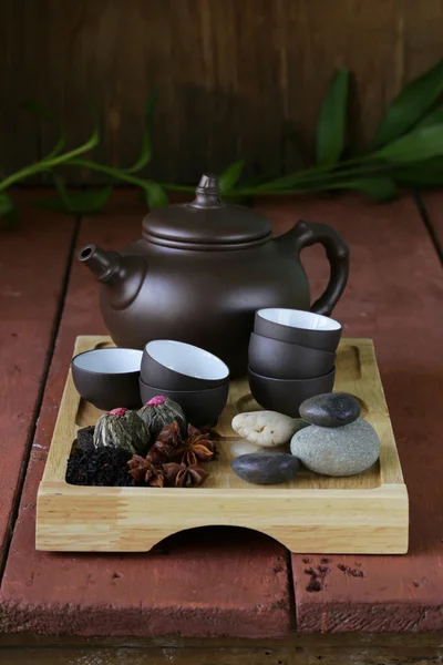 Set for a traditional tea drinking (kettle, cups and various grain tea) — Stock Photo, Image