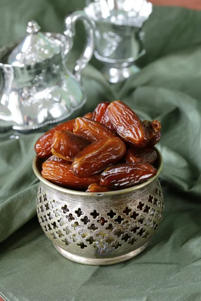 Sweet dates (dry fruits) in metal bowl — Stock Photo, Image