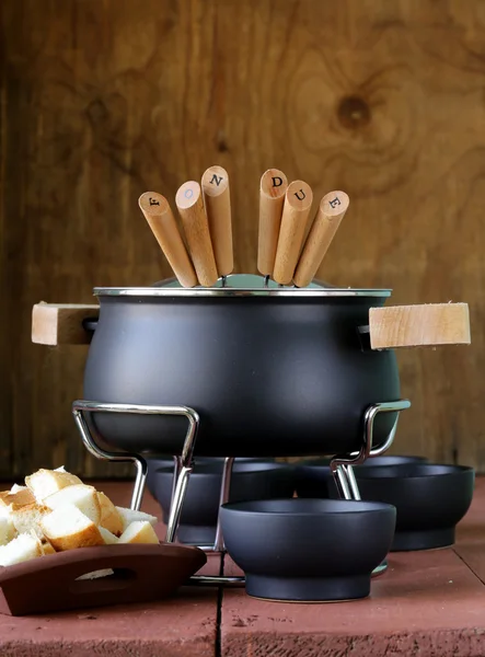 Special set of utensils for cooking fondue — Stock Photo, Image