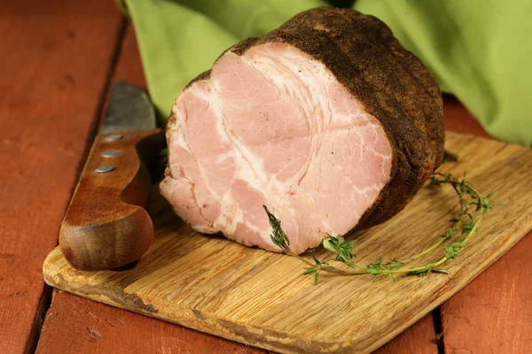 Roasted pork neck with black pepper and herbs — Stock Photo, Image