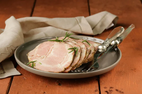 Roasted pork neck with black pepper and herbs — Stock Photo, Image