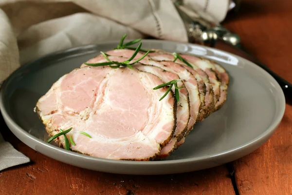 Roasted pork neck with black pepper and herbs — Stock Photo, Image