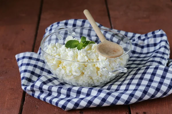 Fresh natural organic cottage cheese in a glass bowl — Stock Photo, Image