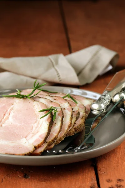 Roasted pork neck with black pepper and herbs — Stock Photo, Image