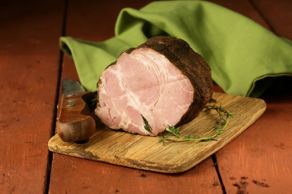 Roasted pork neck with black pepper and herbs — Stock Photo, Image