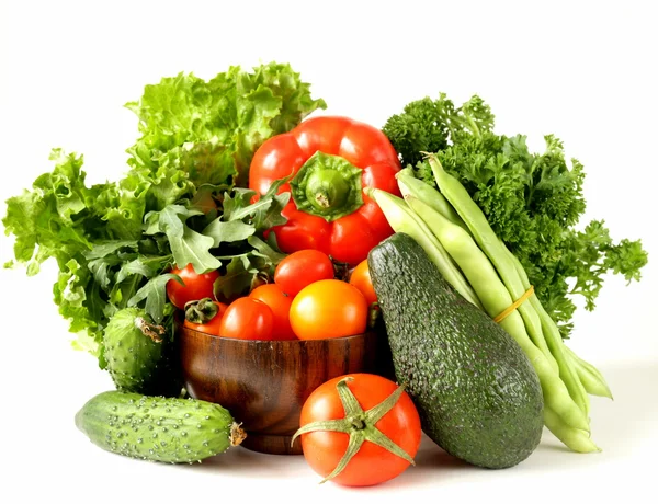Olika grönsaker (avokado, gurka, persilja, paprika, tomat) — Stockfoto