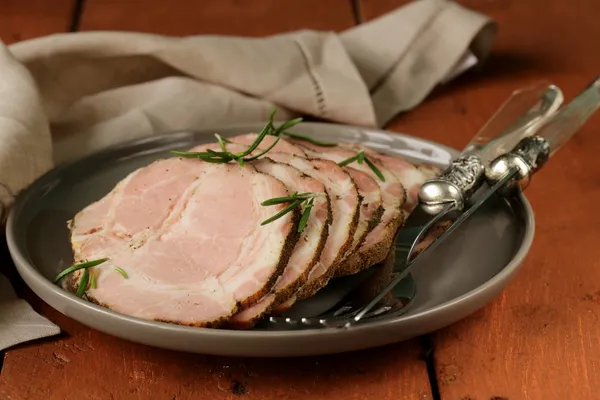 Roasted pork neck with black pepper and herbs — Stock Photo, Image