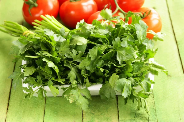 Green fresh organic parsley in a wooden box — Stock Photo, Image