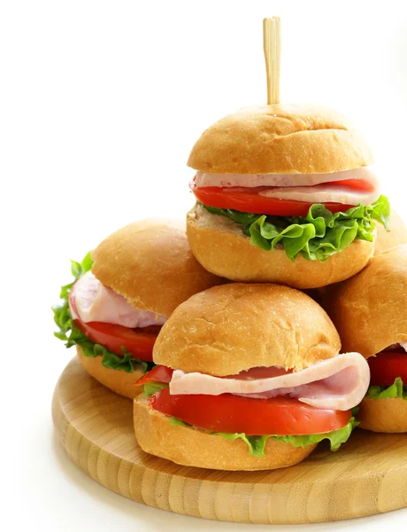 Mini burgers with ham and vegetables - snacks for parties and picnics — Stock Photo, Image