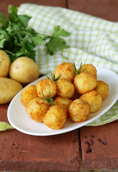 Fried potato balls (croquettes) with rosemary — Stock Photo, Image
