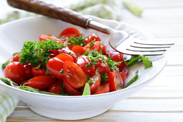 Salad of small cherry tomatoes with parsley and olive oil — Stock Photo, Image