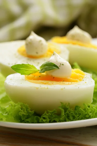 Appetizer of boiled eggs with mayonnaise and spices — Stock Photo, Image