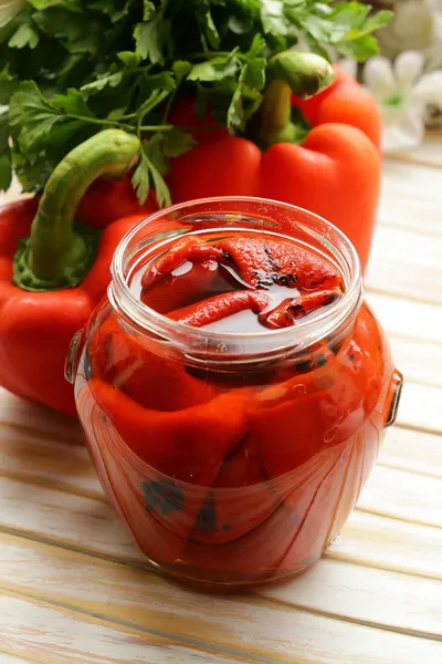Grilled red bell pepper in a glass jar — Stock Photo, Image