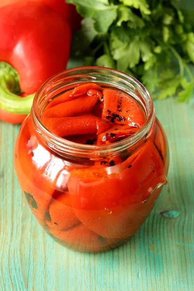 Grilled red bell pepper in a glass jar — Stock Photo, Image