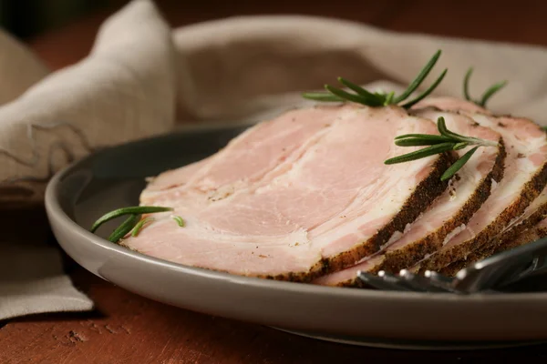 Roasted pork neck with black pepper and herbs — Stock Photo, Image