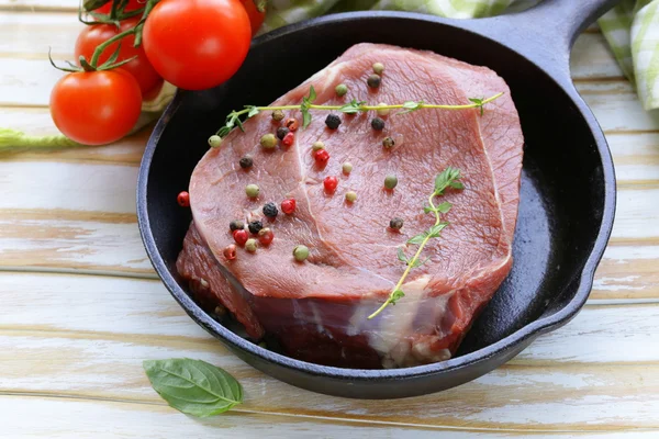 Piece of raw meat beef steak with spices and herbs — Stock Photo, Image