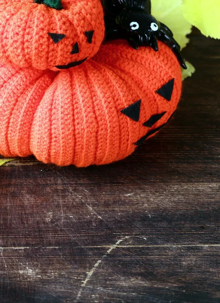 Halloween still life - pumpkin with  yellow leaves on the wooden background — Stock Photo, Image