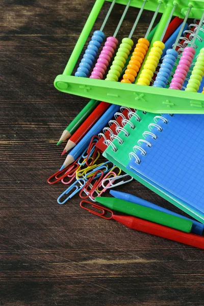 Back to school concept, school stationery multicolored pencils and notebooks — Stock Photo, Image