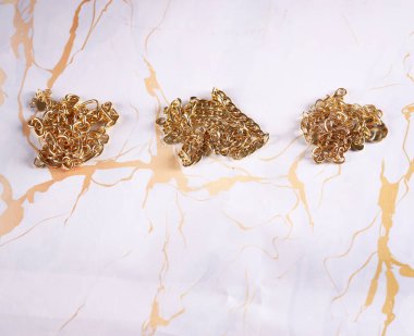 gold jewelry chain necklace on background
