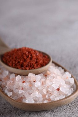 natural pink Hawaiian salt in a spoon