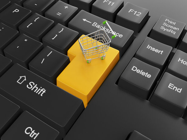 Purchase of goods through online store. Keyboard with a cart on