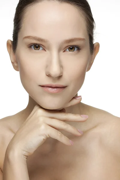 Close-up portrait of a beautiful young woman holding hands by her face — Stock Photo, Image