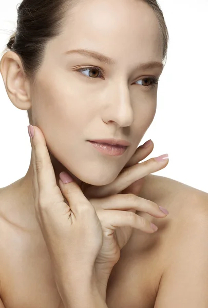 Close-up portrait of a beautiful young woman holding hands by her face — Stock Photo, Image