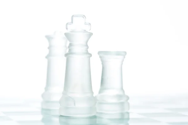 Leadership concept - glass chess on chess board — Stock Photo, Image