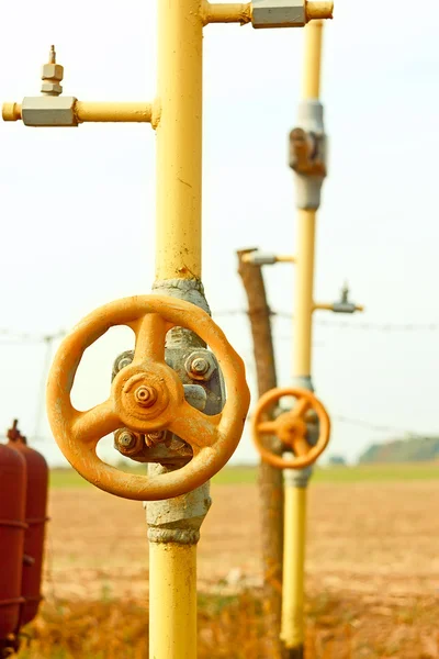 Natural gas station among field — Stock Photo, Image