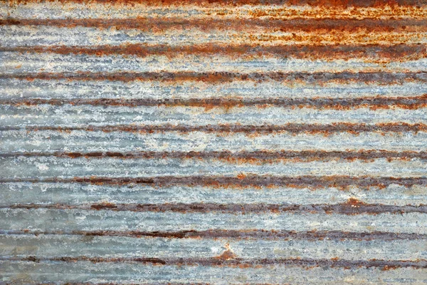 Ribbed metal plate with shelled paint — Stock Photo, Image