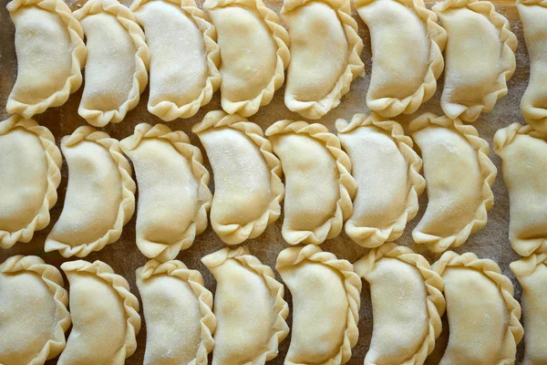 Dumplings on the kitchen board — Stock Photo, Image