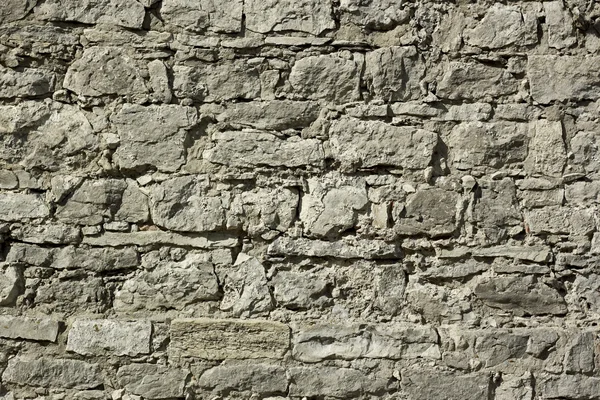 Fragmento de um alívio de parede fortificação antiga — Fotografia de Stock