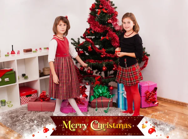 Kids with their christmas presents — Stock Photo, Image