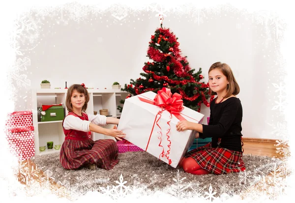 Kids with their christmas presents — Stock Photo, Image