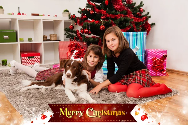 Kids with their christmas presents — Stock Photo, Image