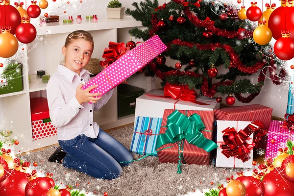 Kids with their christmas presents — Stock Photo, Image